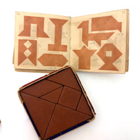 Early (c. 1890s) Richter Anchor Stone Tangram Puzzle with Beautiful Original Designs Booklet