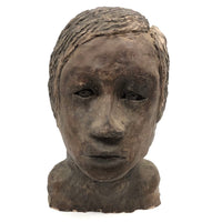 Expressive Hand-sculpted Clay Bust of a Sensitive Looking Boy