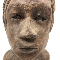 Expressive Hand-sculpted Clay Bust of a Sensitive Looking Boy