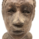 Expressive Hand-sculpted Clay Bust of a Sensitive Looking Boy