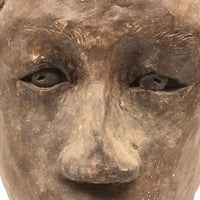 Expressive Hand-sculpted Clay Bust of a Sensitive Looking Boy