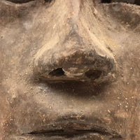 Expressive Hand-sculpted Clay Bust of a Sensitive Looking Boy