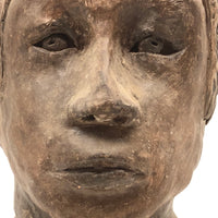 Expressive Hand-sculpted Clay Bust of a Sensitive Looking Boy