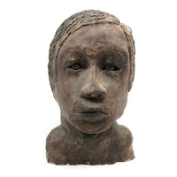 Expressive Hand-sculpted Clay Bust of a Sensitive Looking Boy