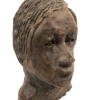 Expressive Hand-sculpted Clay Bust of a Sensitive Looking Boy