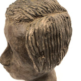 Expressive Hand-sculpted Clay Bust of a Sensitive Looking Boy