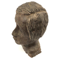 Expressive Hand-sculpted Clay Bust of a Sensitive Looking Boy