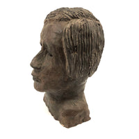 Expressive Hand-sculpted Clay Bust of a Sensitive Looking Boy