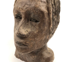 Expressive Hand-sculpted Clay Bust of a Sensitive Looking Boy