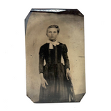 Ghostly Tintype Portrait of Proud Young Woman with Gold Ring and Deep Side Part