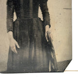 Ghostly Tintype Portrait of Proud Young Woman with Gold Ring and Deep Side Part
