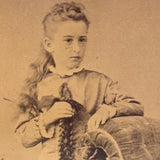 SOLD Young Woman Holding Cut Hair Braids, Unusual 19th Century Cabinet Card in Fine Eastlake Frame
