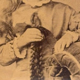 SOLD Young Woman Holding Cut Hair Braids, Unusual 19th Century Cabinet Card in Fine Eastlake Frame