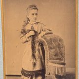 SOLD Young Woman Holding Cut Hair Braids, Unusual 19th Century Cabinet Card in Fine Eastlake Frame