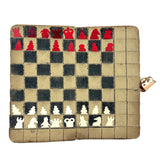 Surprise! c. Late 19th/Early 20th Century Memo Book Turned Stitched and Inked Pocket Chess Board with Celluloid Pieces