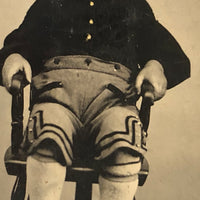 Intense Blushing Boy in Shorts in High Chair, Antique Hand-tinted Tintype