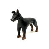 Alert and Poised to Pounce, with Twitching Ear,  Folk Carving Of Black and Brown Dog