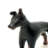Alert and Poised to Pounce, with Twitching Ear,  Folk Carving Of Black and Brown Dog