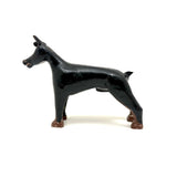 Alert and Poised to Pounce, with Twitching Ear,  Folk Carving Of Black and Brown Dog