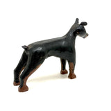 Alert and Poised to Pounce, with Twitching Ear,  Folk Carving Of Black and Brown Dog