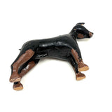 Alert and Poised to Pounce, with Twitching Ear,  Folk Carving Of Black and Brown Dog
