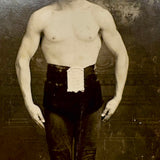 Young Wrestler/Strongman in Prize Belt and Balletic Pose, Antique RPPC (with Bloodstain on Reverse)