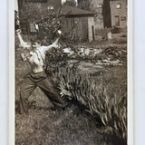 The Champion, Boy in Back Yard with Raised Fists and Protruding Ribs, c. 1940s Snapshot