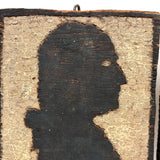 George and Abe, Transcendent Pair of 1930s Carved Silhouettes