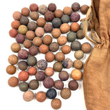 SOLD Charming Antique Hand-sewn Bunny Bag with Inked Face and Clay Marbles