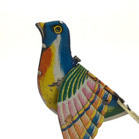 c. 1940s Tin Litho Flapping and Chirping Bird Squeeze Toy