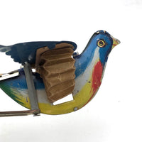c. 1940s Tin Litho Flapping and Chirping Bird Squeeze Toy