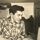 Smitten and Eager Young Man with Photo on Bed, Vintage Snapshot