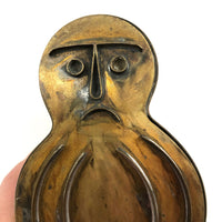 SOLD Curious Frowning Face Brass (Leather? Cookie?) Press