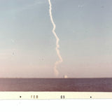 Trail of Smoke Across Hazy Blue Sky, Poignant 1969 Kodak Snapshot