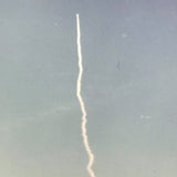 Trail of Smoke Across Hazy Blue Sky, Poignant 1969 Kodak Snapshot