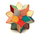 Many Faceted Hand-sewn Cloth over Board Star in Ice Cream Colors with Rattle Inside