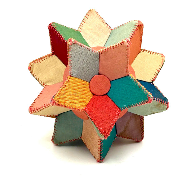 Many Faceted Hand-sewn Cloth over Board Star in Ice Cream Colors with Rattle Inside