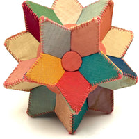 Many Faceted Hand-sewn Cloth over Board Star in Ice Cream Colors with Rattle Inside