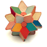 Many Faceted Hand-sewn Cloth over Board Star in Ice Cream Colors with Rattle Inside