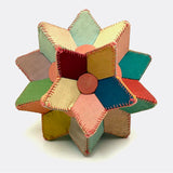 Many Faceted Hand-sewn Cloth over Board Star in Ice Cream Colors with Rattle Inside