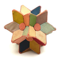 Many Faceted Hand-sewn Cloth over Board Star in Ice Cream Colors with Rattle Inside