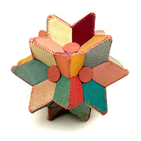 Many Faceted Hand-sewn Cloth over Board Star in Ice Cream Colors with Rattle Inside