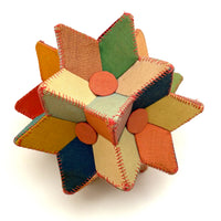 Many Faceted Hand-sewn Cloth over Board Star in Ice Cream Colors with Rattle Inside