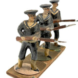 Three Old Painted Lead Royal Navy Sailors with Bayonettes Lined Up in a Row