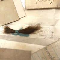 Exactly As Found: 1850s Envelop Filled with Seven Wrapped and Labeled Hair Samples