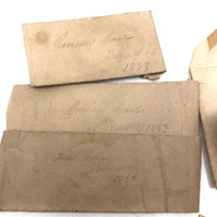 Exactly As Found: 1850s Envelop Filled with Seven Wrapped and Labeled Hair Samples