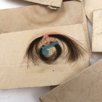 Exactly As Found: 1850s Envelop Filled with Seven Wrapped and Labeled Hair Samples