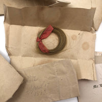 Exactly As Found: 1850s Envelop Filled with Seven Wrapped and Labeled Hair Samples