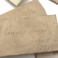 Exactly As Found: 1850s Envelop Filled with Seven Wrapped and Labeled Hair Samples