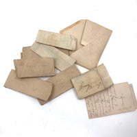 Exactly As Found: 1850s Envelop Filled with Seven Wrapped and Labeled Hair Samples